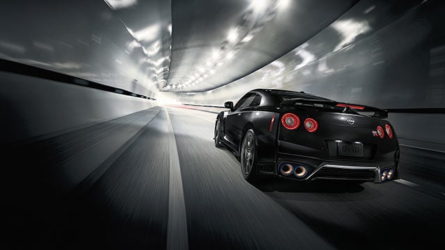 2023 Nissan GT-R seen from behind driving through a tunnel | Scott Clark Nissan in Charlotte NC