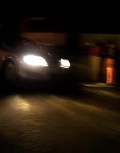 Fast moving car at night
